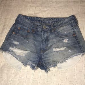Light-wash, distressed jean shorts